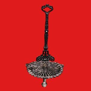 Vintage Royal Blackened Cast Metal Clams Shell Shaped Fireplace Tool Holder